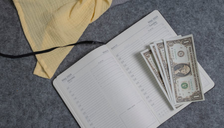 Accountant workplace with copyspace, top view. Money, notebook economy conceptの写真素材