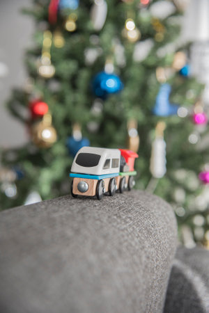 Christmas holiday time,Present gift idea for a toddler.Wooden train toy.の写真素材