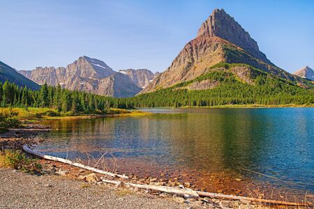 Alpine landscape. Swiftcurrent lake. Glacier National Park. Montana. USAの写真素材