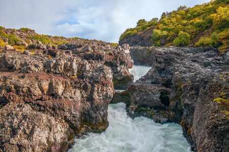 Part of Barnafoss waterfall of Hvita river with a small natural bridge. Icelandの写真素材