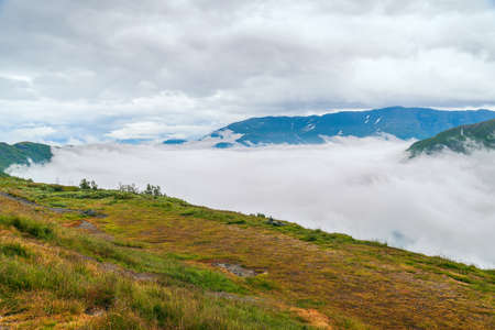 Canyon along the Norwegian National Road 13 filled with clouds. Norwayの写真素材