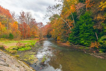 Colorful view downstream of the Clear Fork of the Mohican River from Pleasant Hill Dam. Mohican State Park. Perrysville. Ohio. USAの写真素材