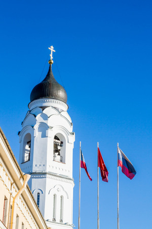 Lomonosov, St. Petersburg, Russia-February 15, 2015. The flag of the Russian Federation on the background of the Church.のeditorial素材