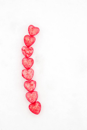 Pink hearts in the snowの写真素材