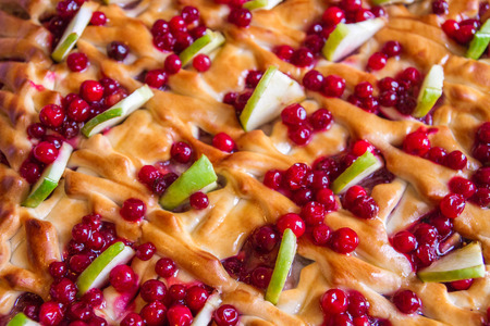 Pie with apples and cranberriesの写真素材
