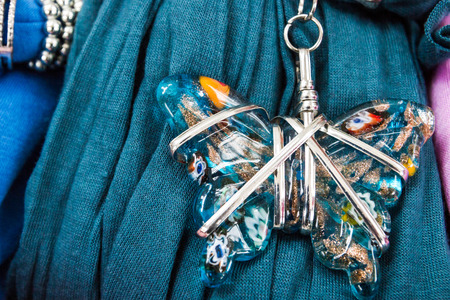 The decoration of stone and metal on the viscose scarfの写真素材