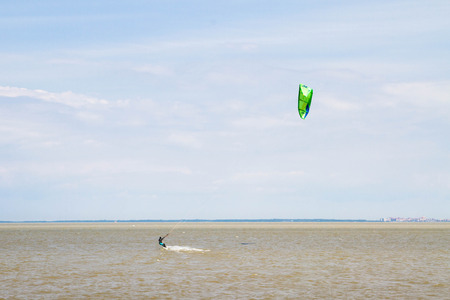 St. Petersburg, Peterhof, Russia, June 21, 2015. Windsurfing on the beach of the Big Izhora Gulf of Finland.のeditorial素材