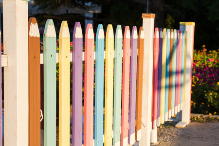 Colorful fence in the form of pencilsの写真素材