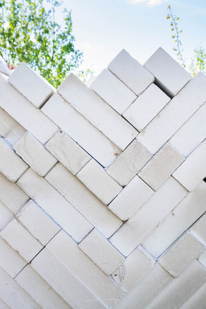 Building material brick for sale on open basis of the buildingの写真素材