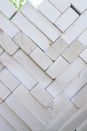 Building material brick for sale on open basis of the buildingの写真素材