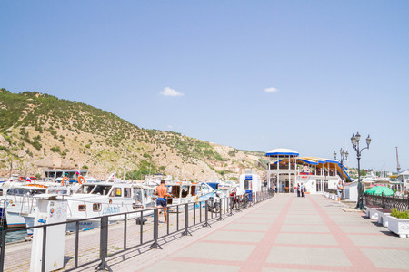 Balaklava, Crimea, Russia, 24 Jun, 2016. The embankment in Balaklava in the Crimea, the jetty with boatsのeditorial素材
