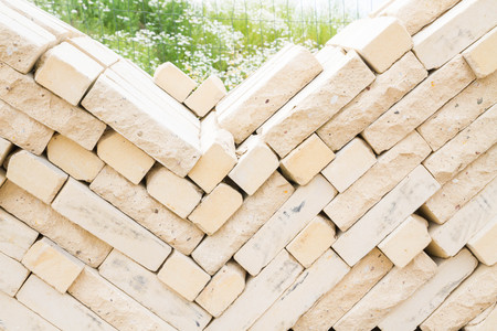 The yellow brick building material for sale in shopの写真素材