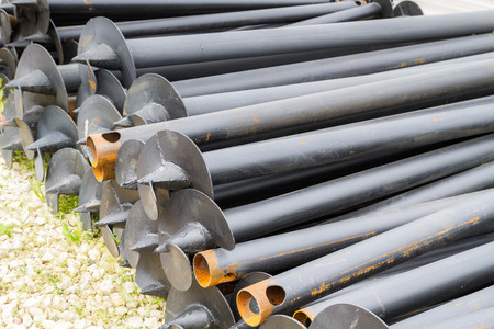 Construction material piles for building foundations for housesの写真素材