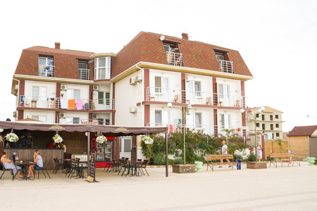 Coastal village, Saki district, Crimea, Russia. September 1, 2017. The black sea embankment in the village of the beachfront Black pearlのeditorial素材