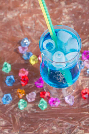 Colourful cocktails with ice on the beach in the hot summerの写真素材