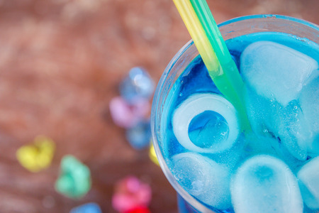 Colourful cocktails with ice on the beach in the hot summerの写真素材