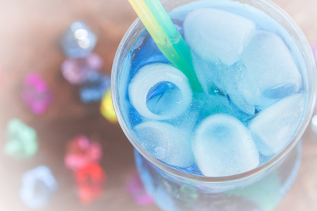 Colourful cocktails with ice on the beach in the hot summerの写真素材