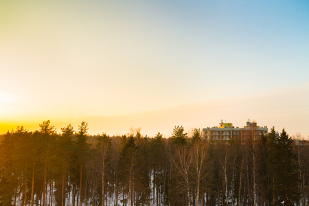 House in construction at the final stage at sunsetの写真素材