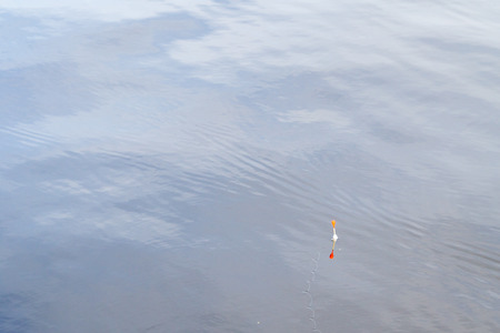 The surface of the water with a float in the summerの写真素材