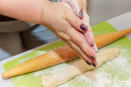 Preparation for cooking homemade dumplings woman chef at homeの写真素材