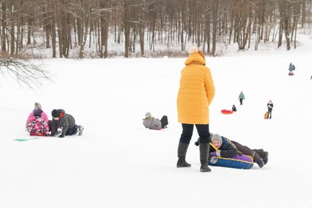 Alexandria Park, Peterhof, St. Petersburg, Russia 04 January 2019. Winter fun skiing with snow...