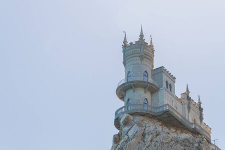 city of Yalta, Crimea, Russia 02 July 2019. The famous place of Crimea Castle Swallow's Nest on the rockのeditorial素材