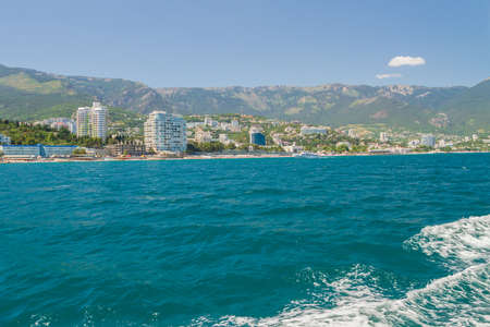 city of Yalta, Crimea, Russia 02 July 2019. Embankment of the city of Yalta on a Sunny summer day sea viewのeditorial素材