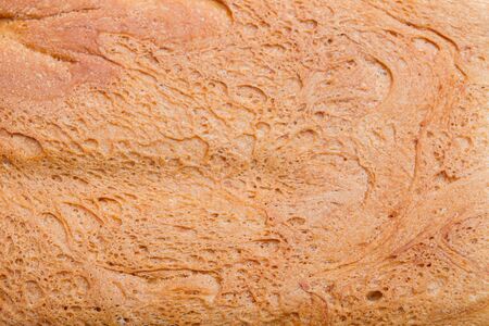 Freshly baked bread was baked at home in a bread maker