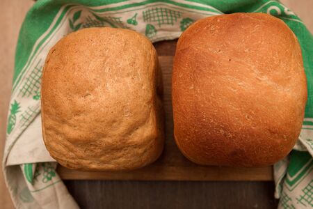 Freshly baked bread was baked at home in a bread maker
