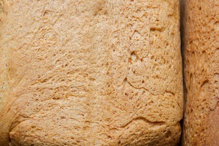 Freshly baked bread was baked at home in a bread maker