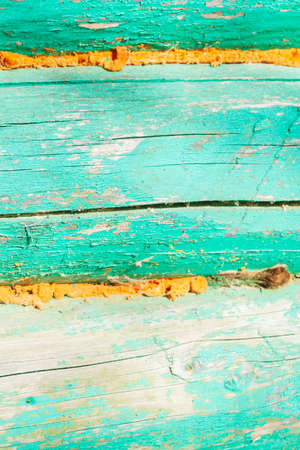 The wall of an old wooden painted houseの写真素材