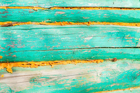 The wall of an old wooden painted houseの写真素材