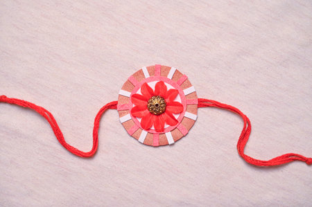 Red ribbon on white background, top view.の写真素材
