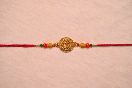 Indian festival raksha bandhan, Rakhi on wooden backgroundの写真素材