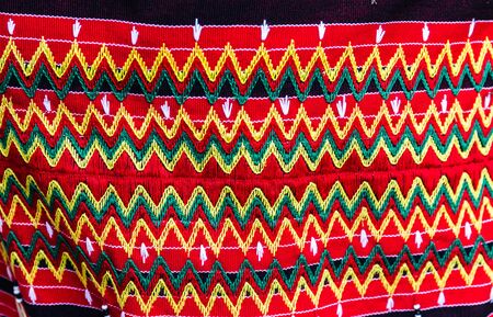 traditional Indonesian natural cotton fabric with colorful zigzag pattern