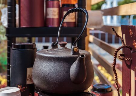japanese herbal tea prepared in brown cast iron teapot with organic dry herbsの写真素材