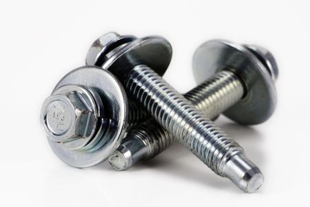 Three bolts with scratches on heads. These are real bolts which are used in the industry.