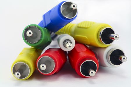 Dark blue, green, yellow, white and red RCA connectors for switching audio and video signals in modern electronic equipmentの写真素材