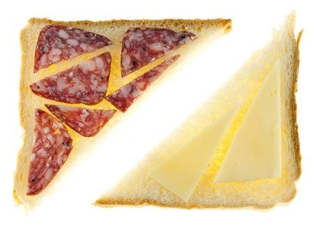 Isolated on white sandwiches with cheese and a salamiの写真素材