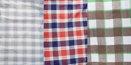 The washed off old cotton checkered fabric set  texture background. Mass productionの写真素材