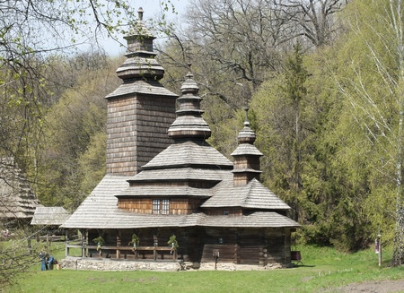 Ancient rural wooden church in spring. The building is constructed 200 years agoの写真素材