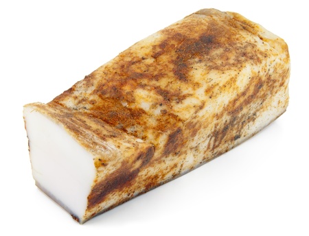 Salty lard with red pepper and  paprika macro. Isolated on whiteの写真素材