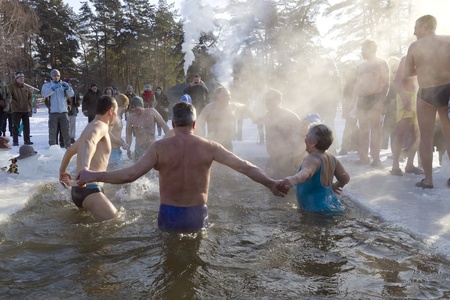 VILNIUS, LITHUANIA - FEBRUARY 4: Fans of winter swimming take a bath in some ice water on February 4, 2012 in Vilnius, Lithuania. 
Sunny day, the air temperature is minus 20  Celsius degrees. のeditorial素材