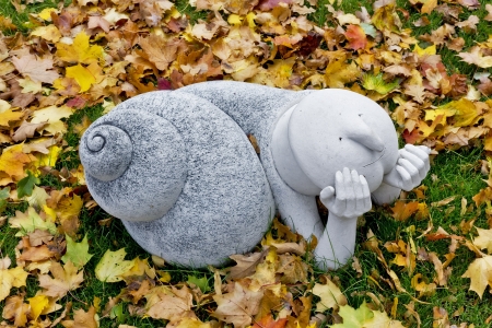 From the life of ordinary snails- public domain concept art sculpture autumn park image の写真素材