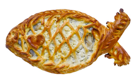 The handmade fish cake is made from a yeast dough. Inside there is a filling of  herring, salmon,  eggs and  cheese. Isolated with patchの写真素材