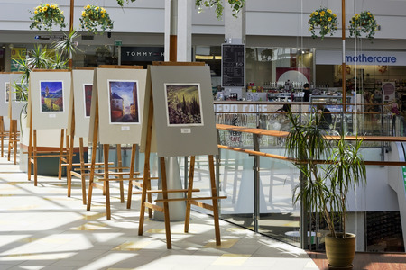 VILNIUS, LITHUANIA - JUNE 10: Exhibition of watercolor pictures of art school  "Alegria" in the Panorama  shopping centre on June 10, 2014. The school was created in 2006. Panorama is the largest shopping place in the capital of Lithuania.のeditorial素材