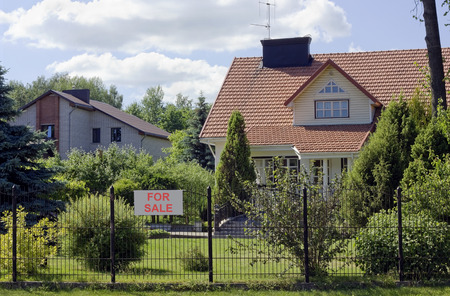 Simple villge rustic  home  and green garden  for sale. Modern European landscapeのeditorial素材