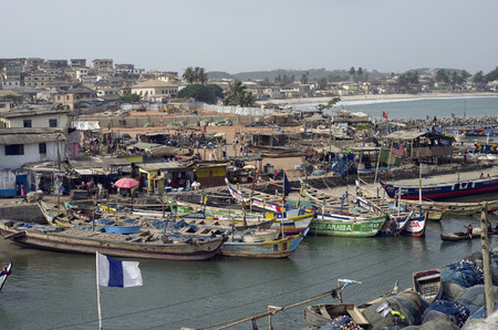 ACCARA, GHANA - FEBRUARY, 2014: Fishing boats in rural fishing village near the capital of the republic Ghana in February 22, 2014. In 1957, Ghana became the first African nation to declare independence from European colonization.のeditorial素材