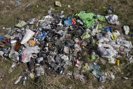 VILNIUS, LITHUANIA - MARCH 29: Heap of dump garbage in spring forest in city public park on March, 29, 2014.  In early spring, environmental volunteers will gather all the garbage.のeditorial素材