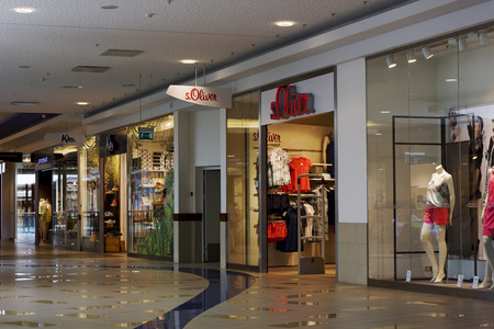 VILNIUS, LITHUANIA - JUNE 10: s.Oliver fashion, clothes & accessories store in the Panorama shopping centre on June 10, 2014. The brand was created in 1969 and has more than 400 shops in 30 countriesのeditorial素材